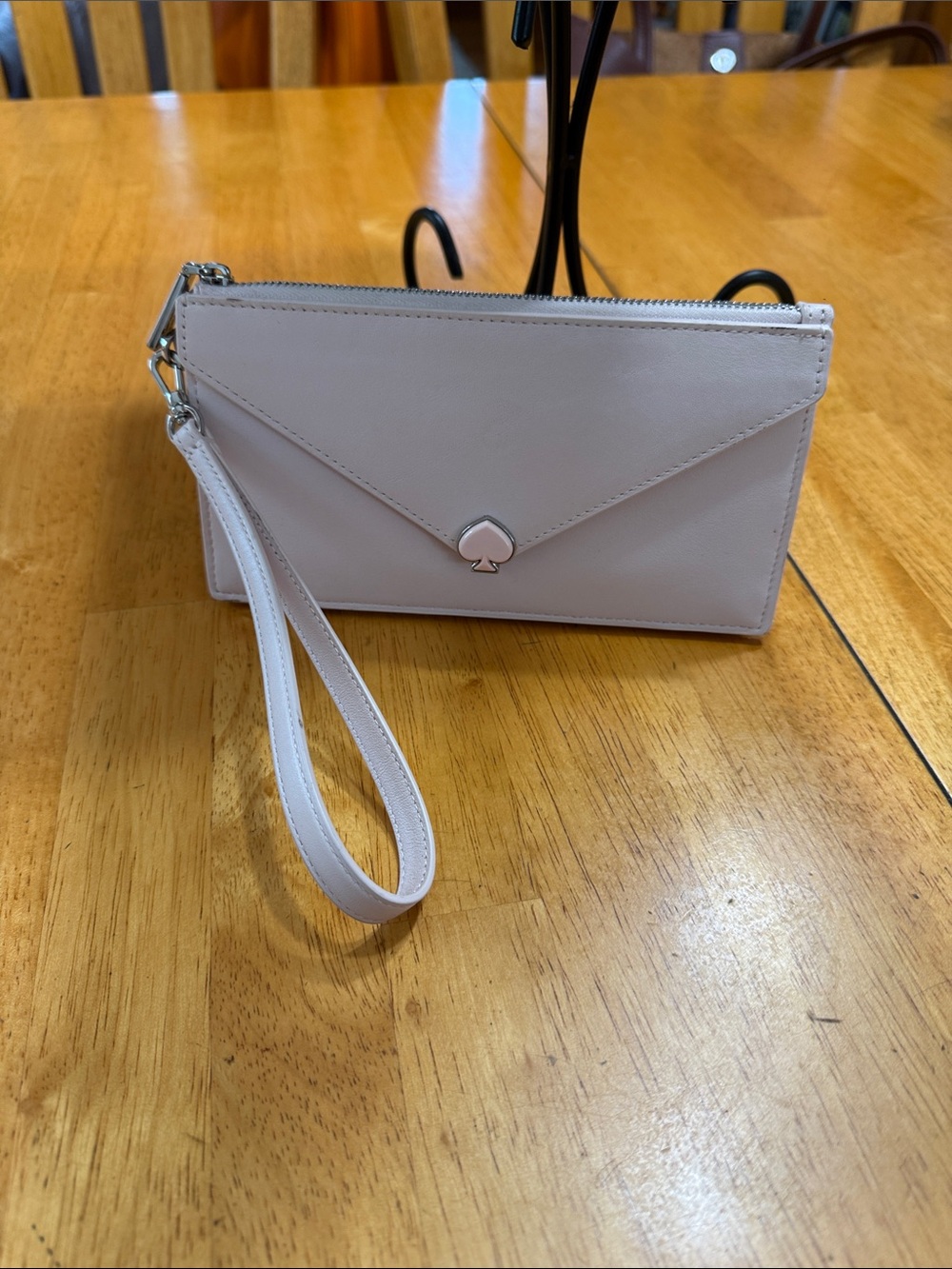 kate spade blush envelope wristlet with spade emblem